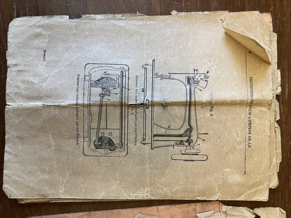 Machine and underside with parts labeled